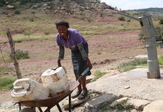 Women Walk Long distances to get water during drought